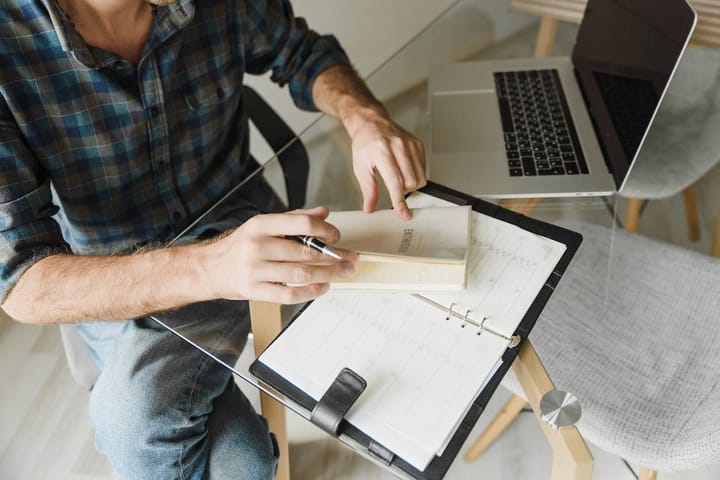 It's essential to be honest when recording your workouts in your journal. If you skipped a workout or didn't perform as well as you'd hoped, write it down (Arina Krasnikova/ Pexels)