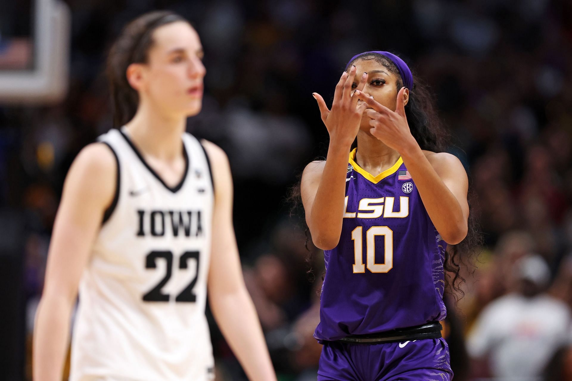 Caitlin Clark of Iowa, left, and Angel Reese of LSU
