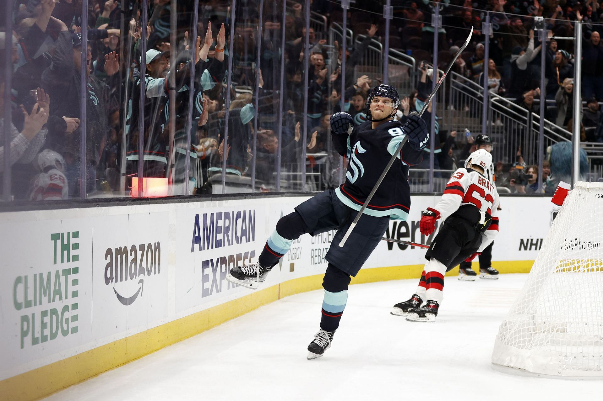 Andre Burakovsky #95 of the Seattle Kraken celebrates his overtime goal against the New Jersey Devils to win 4-3 at Climate Pledge Arena on January 19, 2023 in Seattle, Washington. (Photo by Steph Chambers/Getty Images )