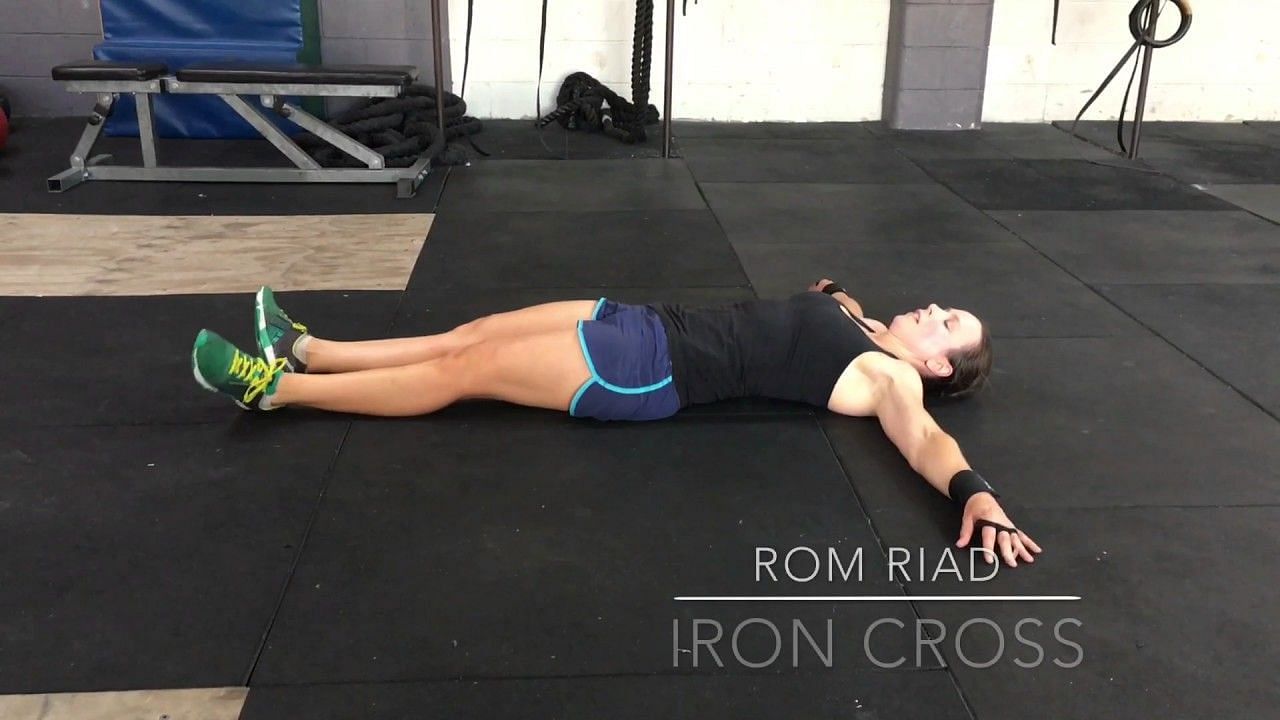 The Iron Cross is a gymnastic movement that involves holding the body in a horizontal position while suspended on gymnastics rings. (Physio Detective/Youtube)