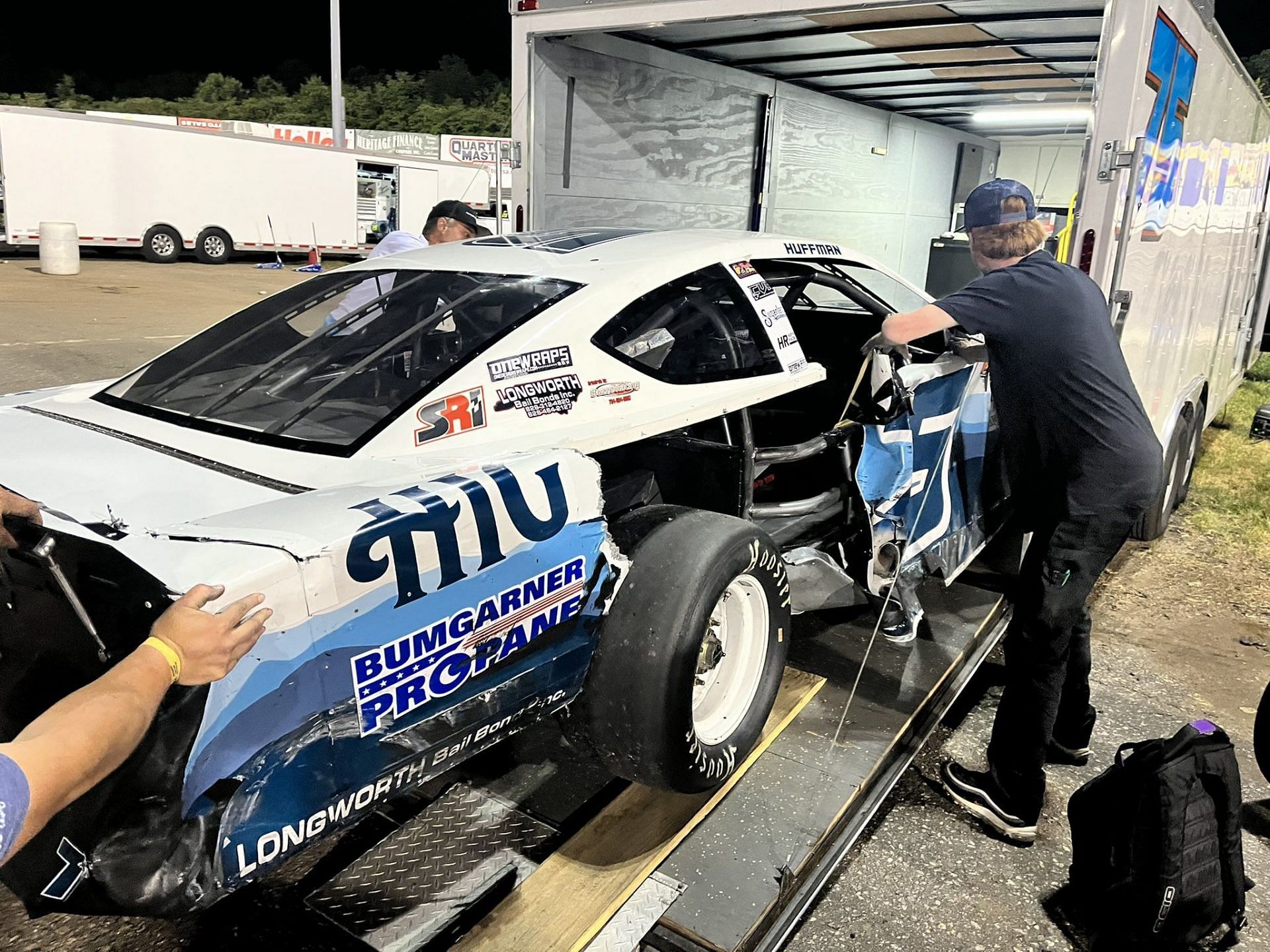 What happened in NASCAR Late model stock racing between Landon Huffman and Annabeth Barnes Crum