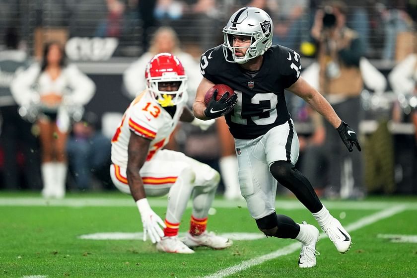 Jan 7, 2023; Paradise, Nevada, USA; Las Vegas Raiders wide receiver Hunter Renfrow (13) runs the ball against the Kansas City Chiefs during the second half at Allegiant Stadium. Mandatory Credit: Gary A. Vasquez-USA TODAY Sports - Green Bay Packers