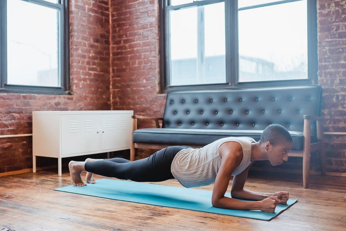For those seeking to enhance their core strength and endurance, the 2-minute plank can be perceived as a challenging yet attainable objective. (Klaus Nielsen/ Pexels)