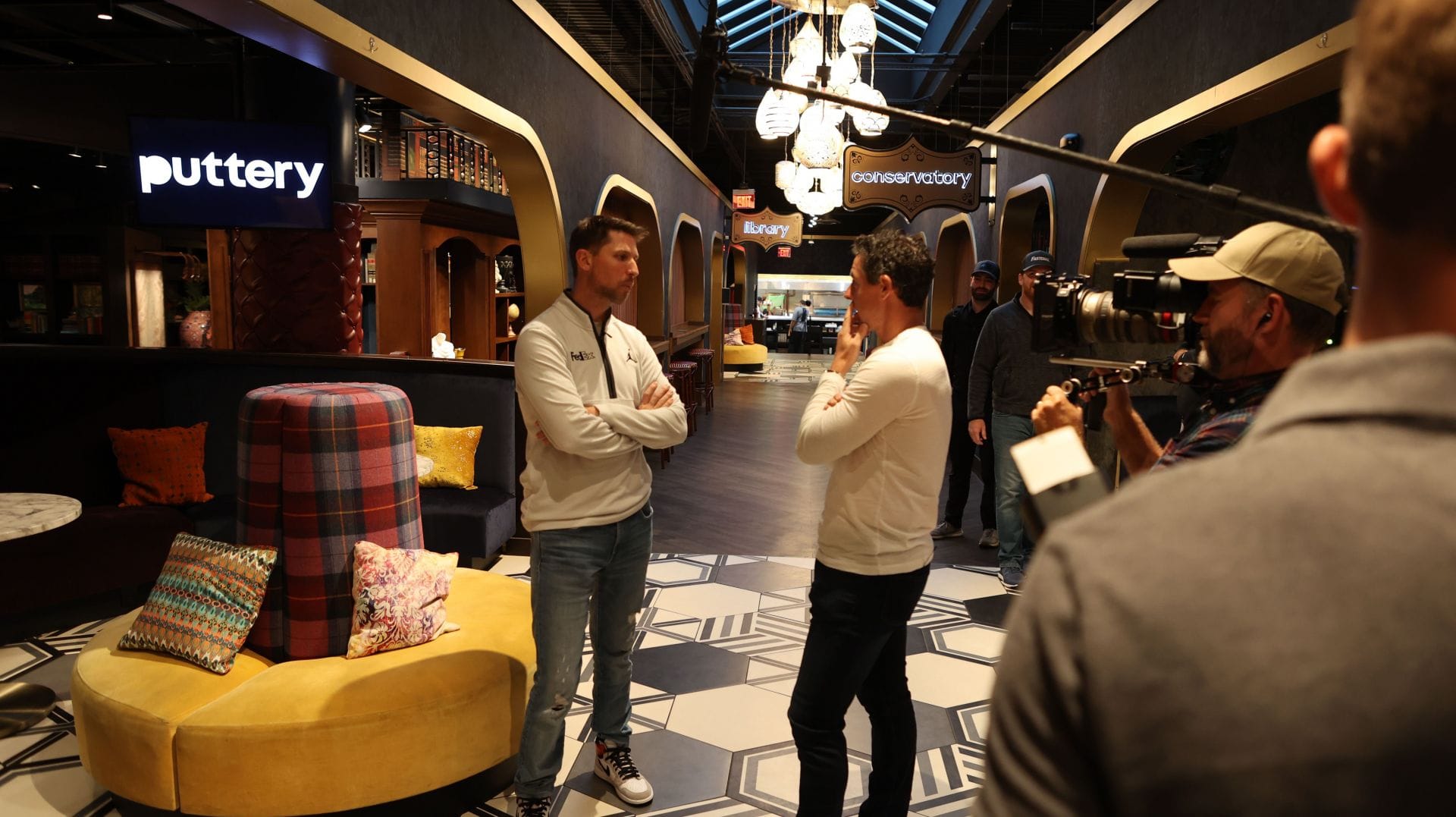 NASCAR star Denny Hamlin joins golf celebrity Rory McIlroy to celebrate