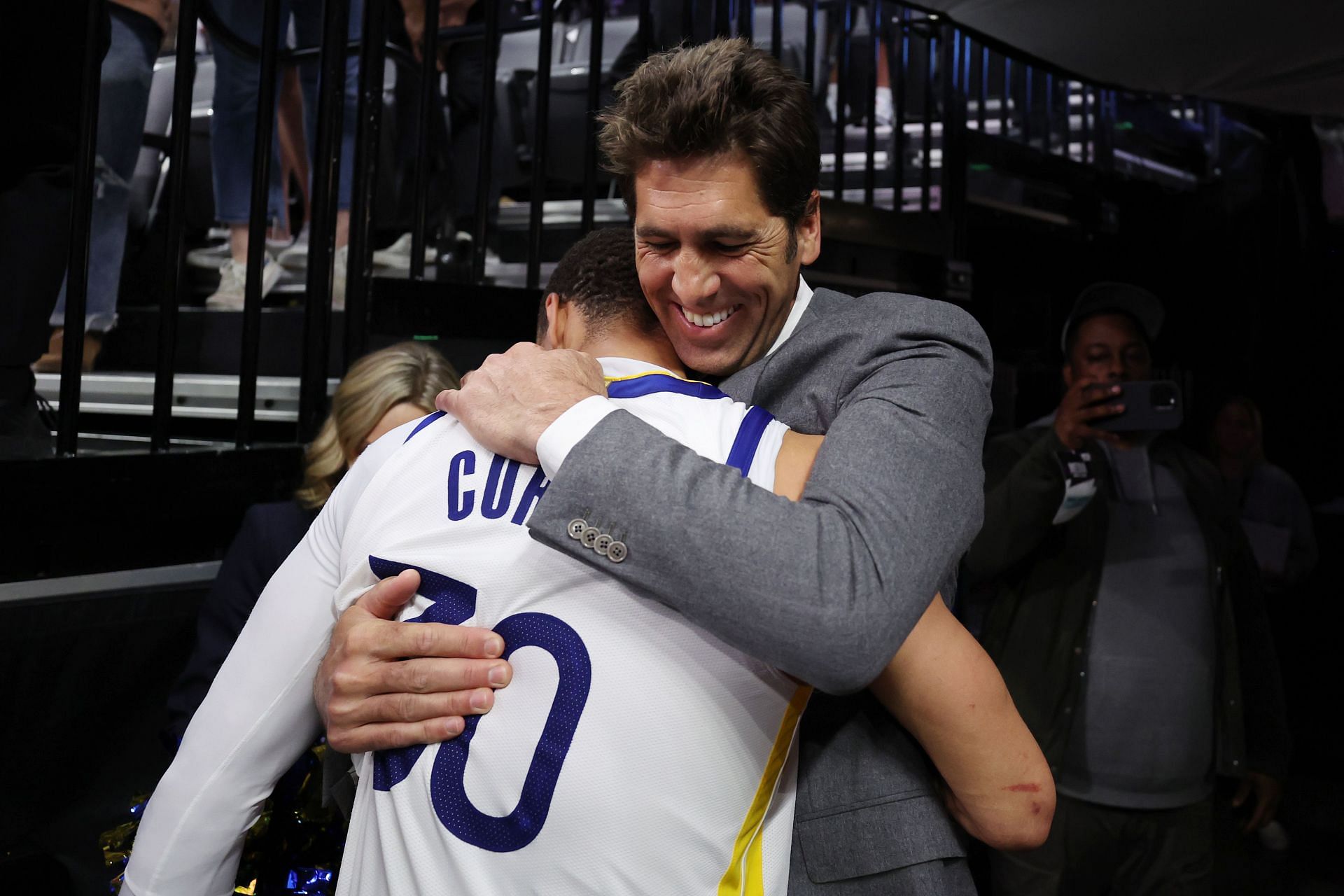 Steph Curry and Bob Myers of the Golden State Warriors