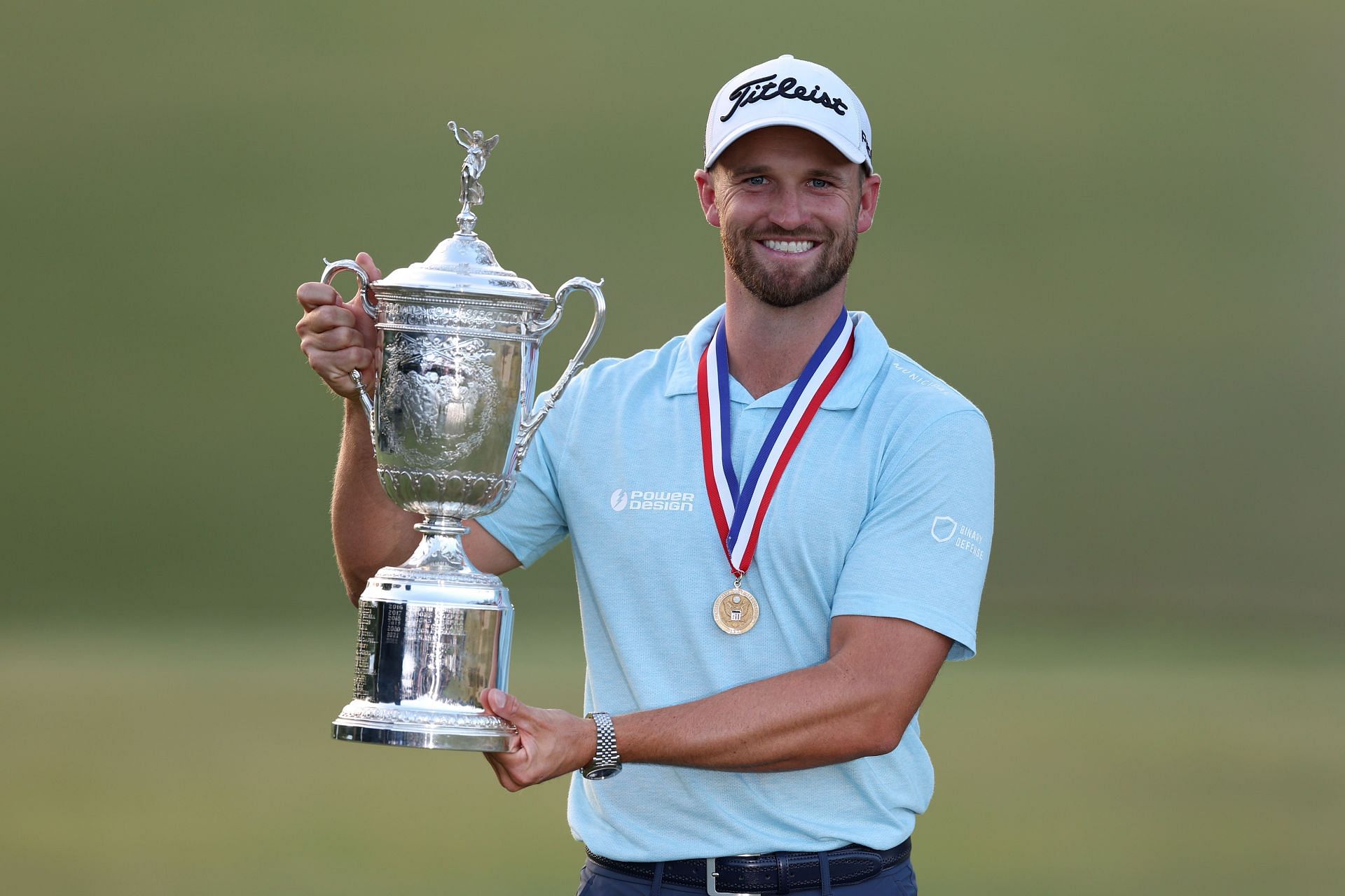 Windham Clark poses with the trophy and medal after winning the 123rd US Open