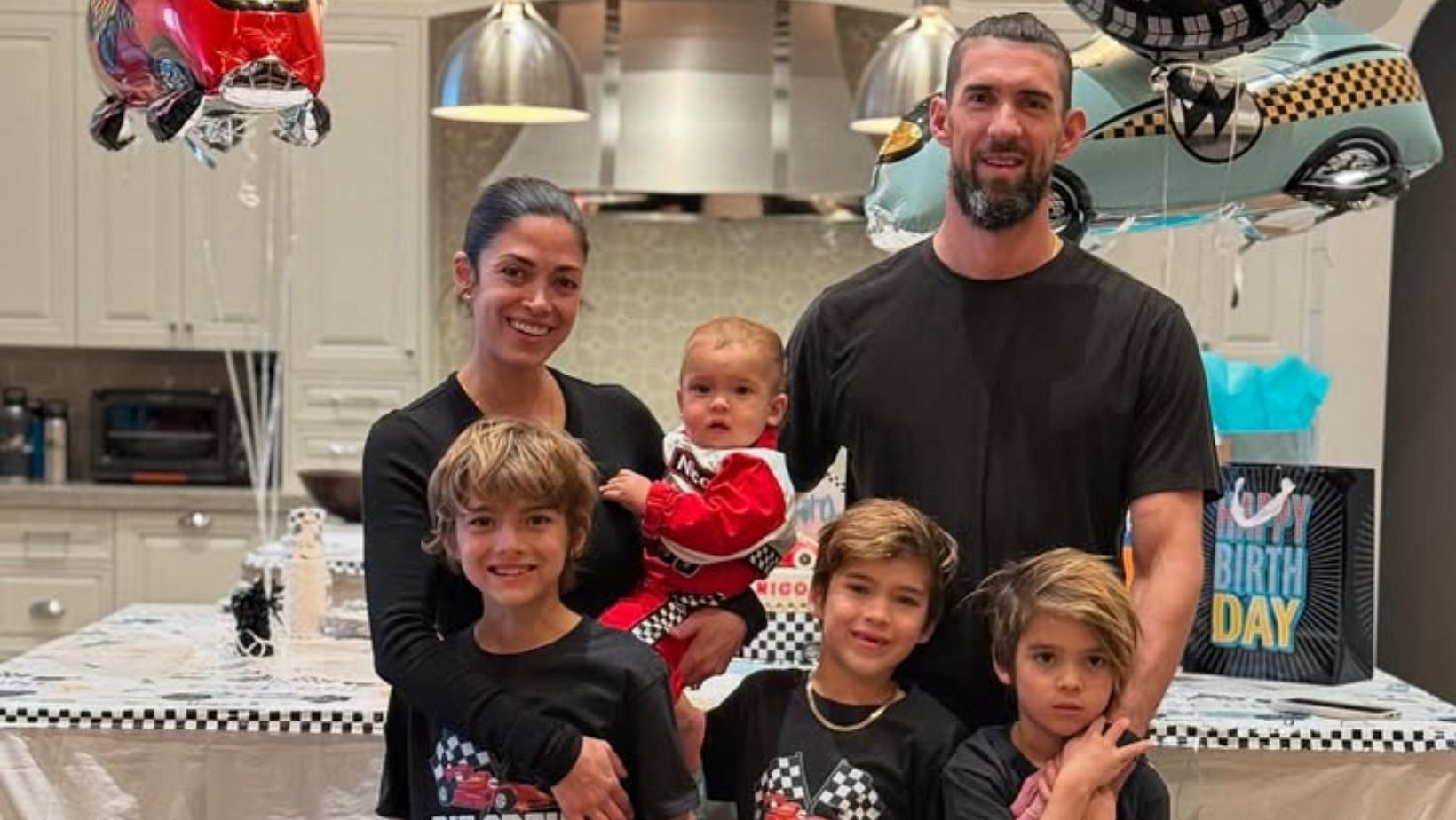 Michael Phelps wife Nicole reacts as their son Beckett enjoys summer swimming with friends