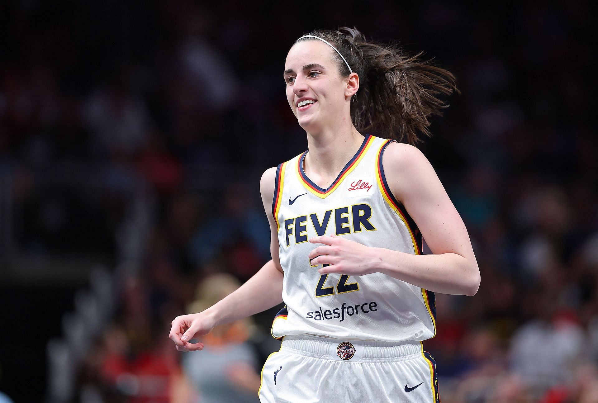 Caitlin Clarks babysitting duty steals spotlight as injured Fever star adorably storms tunnel walk