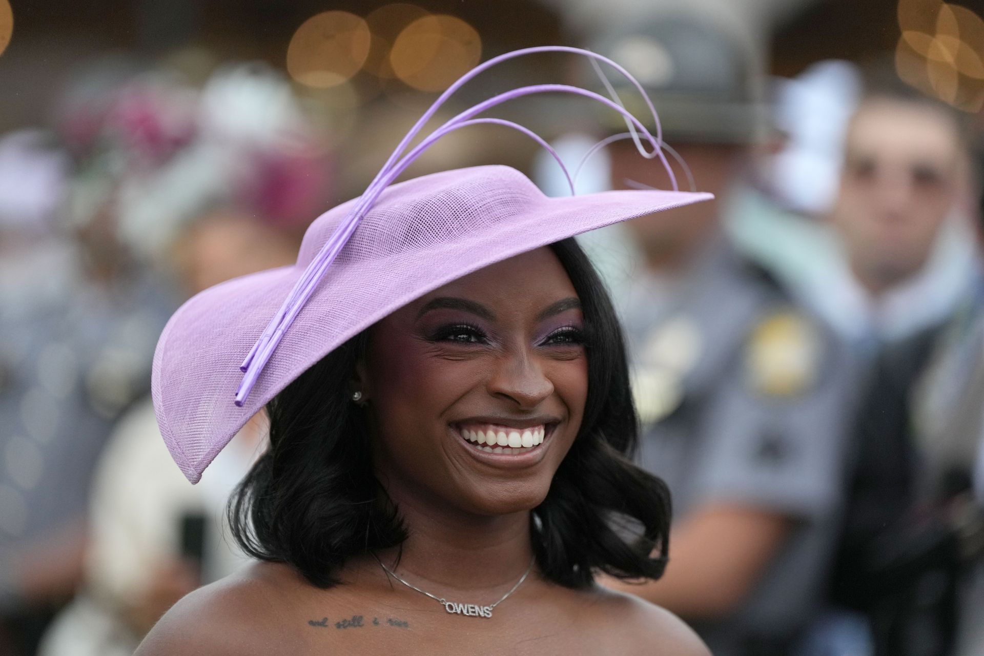 Simone Biles turns up the glamor in a stunning white outfit as she makes an appearance with husband Jonathan Owens at Kentucky Derby