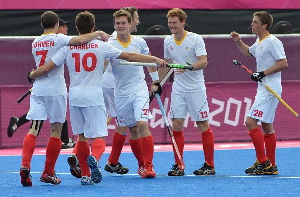Tom Boon (C) of Belgium celebrates with teammates after scoring a goal during the men&#039;s field hockey preliminary round match between New Zealand and Belgium at The Riverbank Arena in London on August 5, 2012, during the London 2012 Olympic Games. AFP PHOTO/ INDRANIL MUKHERJEE        (Photo credit should read INDRANIL MUKHERJEE/AFP/GettyImages)