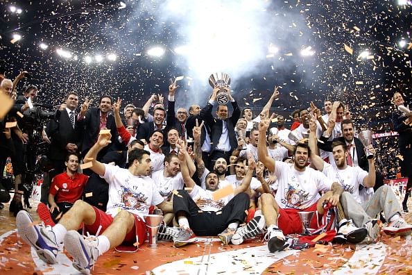 Olympiacos Piraeus celebrate during the Turkish Airlines EuroLeague Final Four 2013 Champions Awards Ceremony at O2 Arena on May 12, 2013 in London, United Kingdom.  (Photo by Ulf Duda/EB via Getty Images)