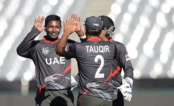 Krishna Chandran celebrates with his UAE teammates