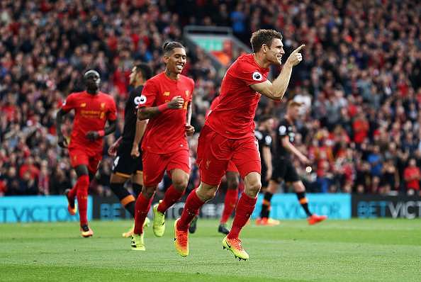 LIVERPOOL, ENGLAND - SEPTEMBER 24:  James Milner of Liverpool celebrates scoring his sides second goal during the Premier League match between Liverpool and Hull City at Anfield on September 24, 2016 in Liverpool, England.  (Photo by Julian Finney/Getty Images)