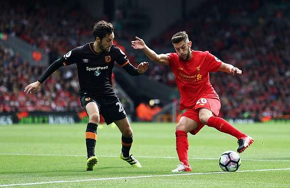 LIVERPOOL, ENGLAND - SEPTEMBER 24:  Adam Lallana of Liverpool is faced by Ryan Mason of Hull City during the Premier League match between Liverpool and Hull City at Anfield on September 24, 2016 in Liverpool, England.  (Photo by Julian Finney/Getty Images)