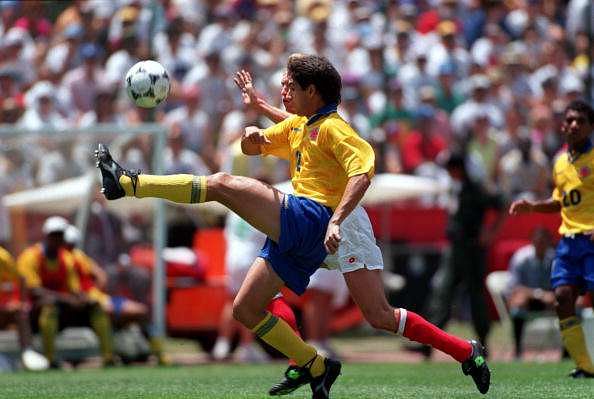 26 JUN 1994:  ANDRES ESCOBAR OF COLOMBIA CONTROLS THE BALL DURING COLOMBIA&#039;s 2-0 VICTORY OVER SWITZERLAND IN A 1994 WORLD CUP GAME AT STANFORD STADIUM IN PALO ALTO, CALIFORNIA. Mandatory Credit: David Cannon/ALLSPORT