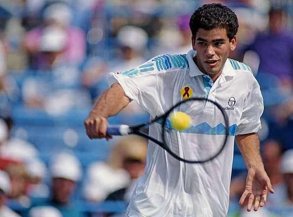 Pete Sampras of the United States makes a back hand return to Jim Courier during their Men&#039;s Singles Semi Final match of the United States Open Tennis Championship on 11 September 1992 at the USTA National Tennis Center in New York City, New York, United States. (Photo by Simon Bruty/Getty Images)