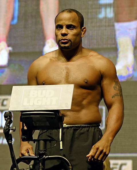 LAS VEGAS, NV - JULY 08:  Mixed martial artist Daniel Cormier poses on the scale during his weigh-in for UFC 200 at T-Mobile Arena on July 8, 2016 in Las Vegas, Nevada. Cormier will meet Anderson Silva in a non-title light heavyweight bout on July 9 at T-Mobile Arena. Silva replaces Jon Jones who was pulled from a light heavyweight title fight against Cormier due to a potential violation of the UFC&#039;s anti-doping policy.  (Photo by Ethan Miller/Getty Images)