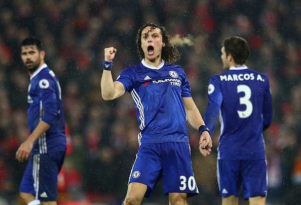 LIVERPOOL, ENGLAND - JANUARY 31:  David Luiz of Chelsea celebrates scoring the opening goal during the Premier League match between Liverpool and Chelsea at Anfield on January 31, 2017 in Liverpool, England.  (Photo by Clive Mason/Getty Images)
