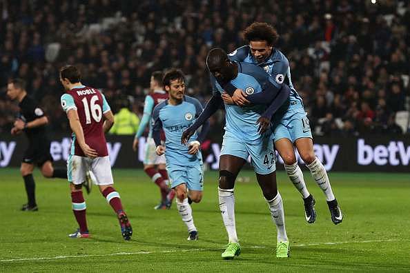 STRATFORD, ENGLAND - FEBRUARY 01:  Yaya Toure of Manchester City celebrates scoring his team&#039;s fourth goal with Leroy Sane during the Premier League match between West Ham United and Manchester City at London Stadium on February 1, 2017 in Stratford, England.  (Photo by Clive Rose/Getty Images)