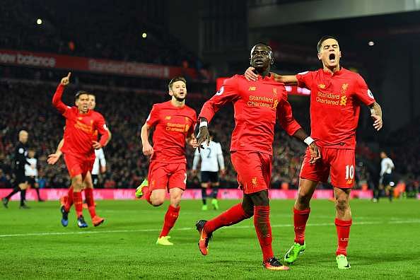 LIVERPOOL, ENGLAND - FEBRUARY 11:  Sadio Mane (2nd R) of Liverpool celebrates scoring his side&#039;s second goal with his team mate Philippe Coutinho (1st R) during the Premier League match between Liverpool and Tottenham Hotspur at Anfield on February 11, 2017 in Liverpool, England.  (Photo by Mike Hewitt/Getty Images for Tottenham Hotspur FC)