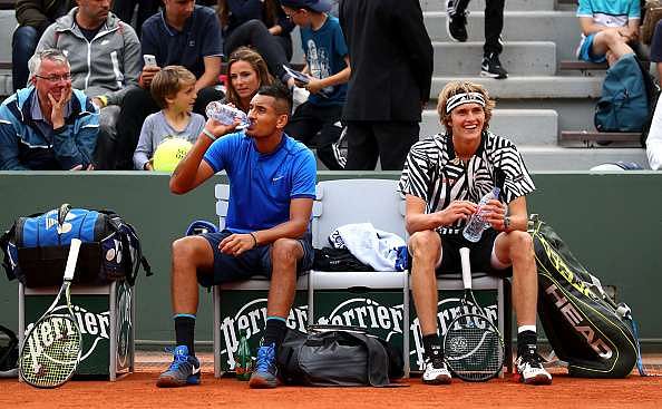 PARIS, FRANCE - MAY 26:  Nick Kyrgios of Australia and Alexander Zverev of Germany take a break during the Men&#039;s Singles second round match against Pablo Carreno Busta and David Marrero of Spain on day five of the 2016 French Open at Roland Garros on May 26, 2016 in Paris, France.  (Photo by Julian Finney/Getty Images)