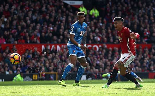 MANCHESTER, ENGLAND - MARCH 04: Marcos Rojo of Manchester United (R) scores his sides first goal during the Premier League match between Manchester United and AFC Bournemouth at Old Trafford on March 4, 2017 in Manchester, England.  (Photo by Julian Finney/Getty Images)