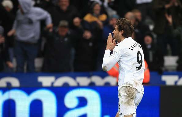 SWANSEA, WALES - MARCH 04: Fernando Llorente of Swansea City celebrates scoring his sides third goal during the Premier League match between Swansea City and Burnley at Liberty Stadium on March 4, 2017 in Swansea, Wales.  (Photo by Ben Hoskins/Getty Images)