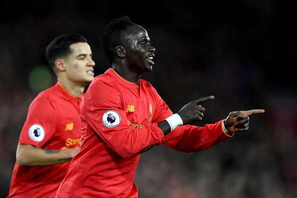 LIVERPOOL, ENGLAND - MARCH 04:  Sadio Mane of Liverpool celebrates scoring his sides second goal during the Premier League match between Liverpool and Arsenal at Anfield on March 4, 2017 in Liverpool, England.  (Photo by Laurence Griffiths/Getty Images)