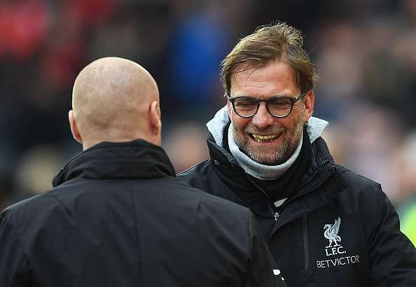 LIVERPOOL, ENGLAND - MARCH 12:  Jurgen Klopp manager of Liverpool and Sean Dyche manager of Burnley shake hands prior to the Premier League match between Liverpool and Burnley at Anfield on March 12, 2017 in Liverpool, England.  (Photo by Michael Regan/Getty Images)