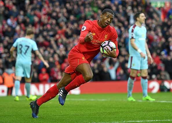 LIVERPOOL, ENGLAND - MARCH 12:  Georginio Wijnaldum of Liverpool celebrates as he scores their first and equalising goal during the Premier League match between Liverpool and Burnley at Anfield on March 12, 2017 in Liverpool, England.  (Photo by Michael Regan/Getty Images)