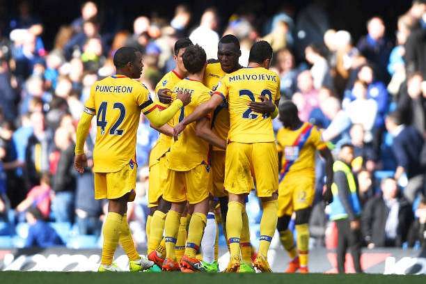 LONDON, ENGLAND - APRIL 01: Christian Benteke of Crystal Palace celebrates scoring his sides second goal with his Crystal Palace team mates during the Premier League match between Chelsea and Crystal Palace at Stamford Bridge on April 1, 2017 in London, England.  (Photo by Mike Hewitt/Getty Images)