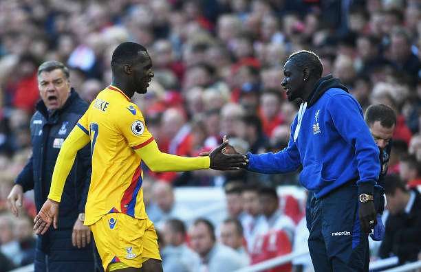 LIVERPOOL, ENGLAND - APRIL 23:  Christian Benteke (L) of Crystal Palace celebrates scoring his side&#039;s first goal with his team mate Bakary Sako (R) during the Premier League match between Liverpool and Crystal Palace at Anfield on April 23, 2017 in Liverpool, England.  (Photo by Laurence Griffiths/Getty Images)