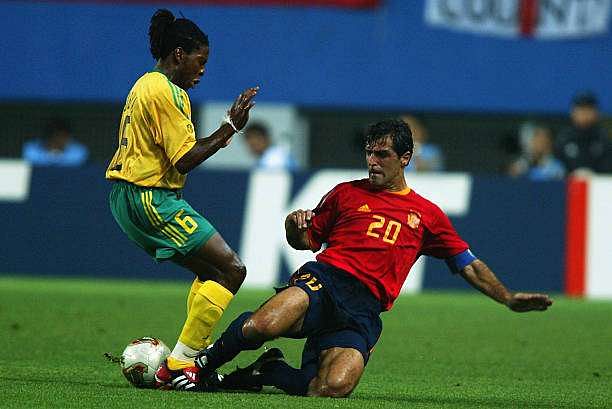 DAEJEON - JUNE 12:  MacBeth Sibaya of South Africa is tackled by Miguel Angel Nadal of Spain during the Spain v South Africa, Group B, World Cup Group Stage match played at the Daejeon World Cup Stadium, Daejeon, South Korea on June 12, 2002. Spain won 3-2. (Photo by Ben Radford/Getty Images)
