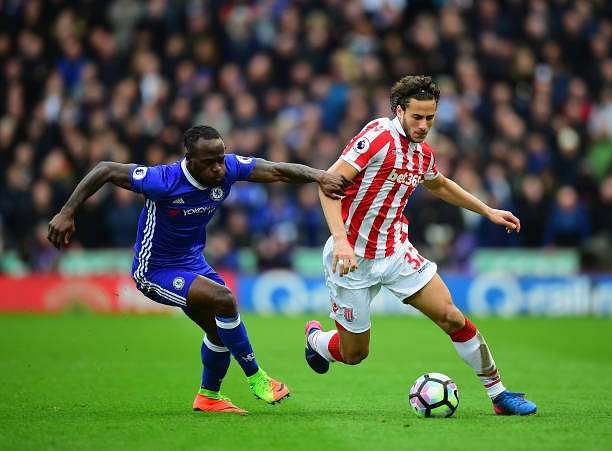 STOKE ON TRENT, ENGLAND - MARCH 18:  Ramadan of Stoke City is tackled by Victor Moses of Chelsea during the Premier League match between Stoke City and Chelsea at Bet365 Stadium on March 18, 2017 in Stoke on Trent, England.  (Photo by Tony Marshall/Getty Images)