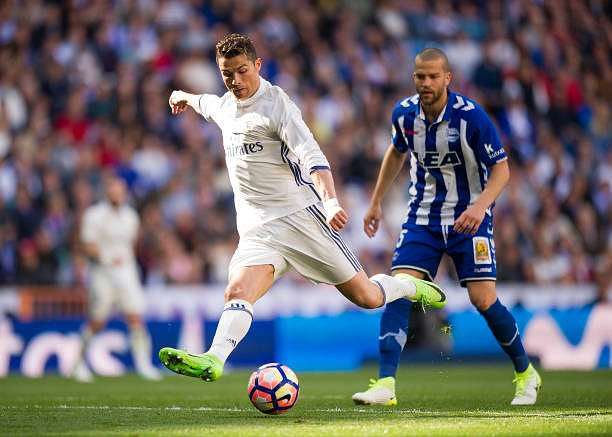 MADRID, SPAIN - APRIL 02:  Cristiano Ronaldo of Real Madrid has a shot at goal during the La Liga match between Real Madrid CF and Deportivo Alaves on April 2, 2017 in Madrid, Spain.  (Photo by Denis Doyle/Getty Images)