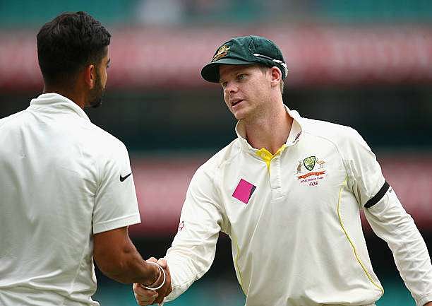 SYDNEY, AUSTRALIA - JANUARY 10: Australian captain Steve Smith shakes hands with Virat Kohli of India after winning the series during day five of the Fourth Test match between Australia and India at Sydney Cricket Ground on January 10, 2015 in Sydney, Australia.  (Photo by Cameron Spencer/Getty Images)