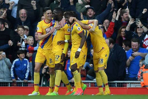LIVERPOOL, ENGLAND - APRIL 23:  Christian Benteke (2nd L) of Crystal Palace celebrates his side&#039;s second goal with his team mates during the Premier League match between Liverpool and Crystal Palace at Anfield on April 23, 2017 in Liverpool, England.  (Photo by Laurence Griffiths/Getty Images)