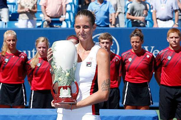 MASON, OH - AUGUST 21: Karolina Pliskova of the Czech Republic holds the winner&#039;s trophy after defeating Angelique Kerber of Germany in the women&#039;s final on Day 9 of the Western &amp; Southern Open at the Lindner Family Tennis Center on August 21, 2016 in Mason, Ohio. (Photo by Joe Robbins/Getty Images)